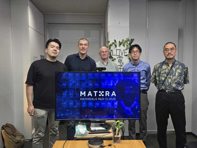 A group meeting in Japan with Mat3ra Materials R&D Cloud on the screen